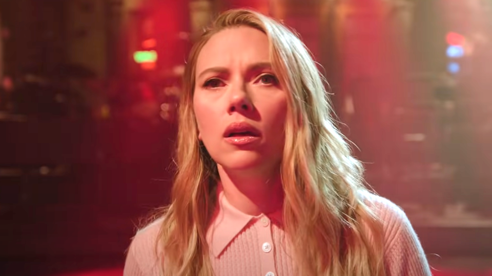 Bad Bunny performing on SNL Season 50 finale with Scarlett Johansson as host
