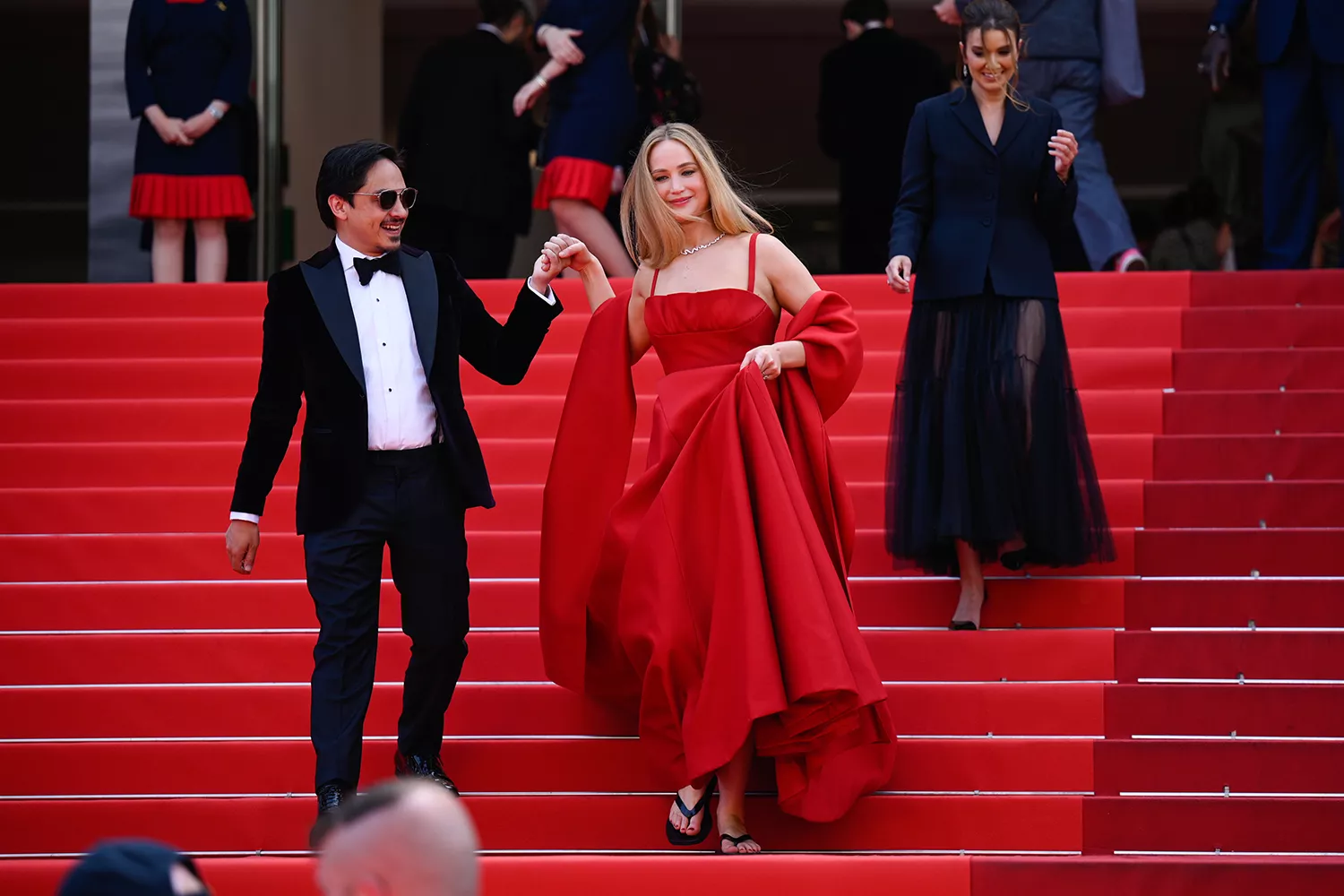 Zoe Saldana receives a kiss from Marco Perego on the Cannes red carpet