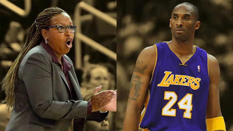 Cynthia Cooper holding a basketball on the court
