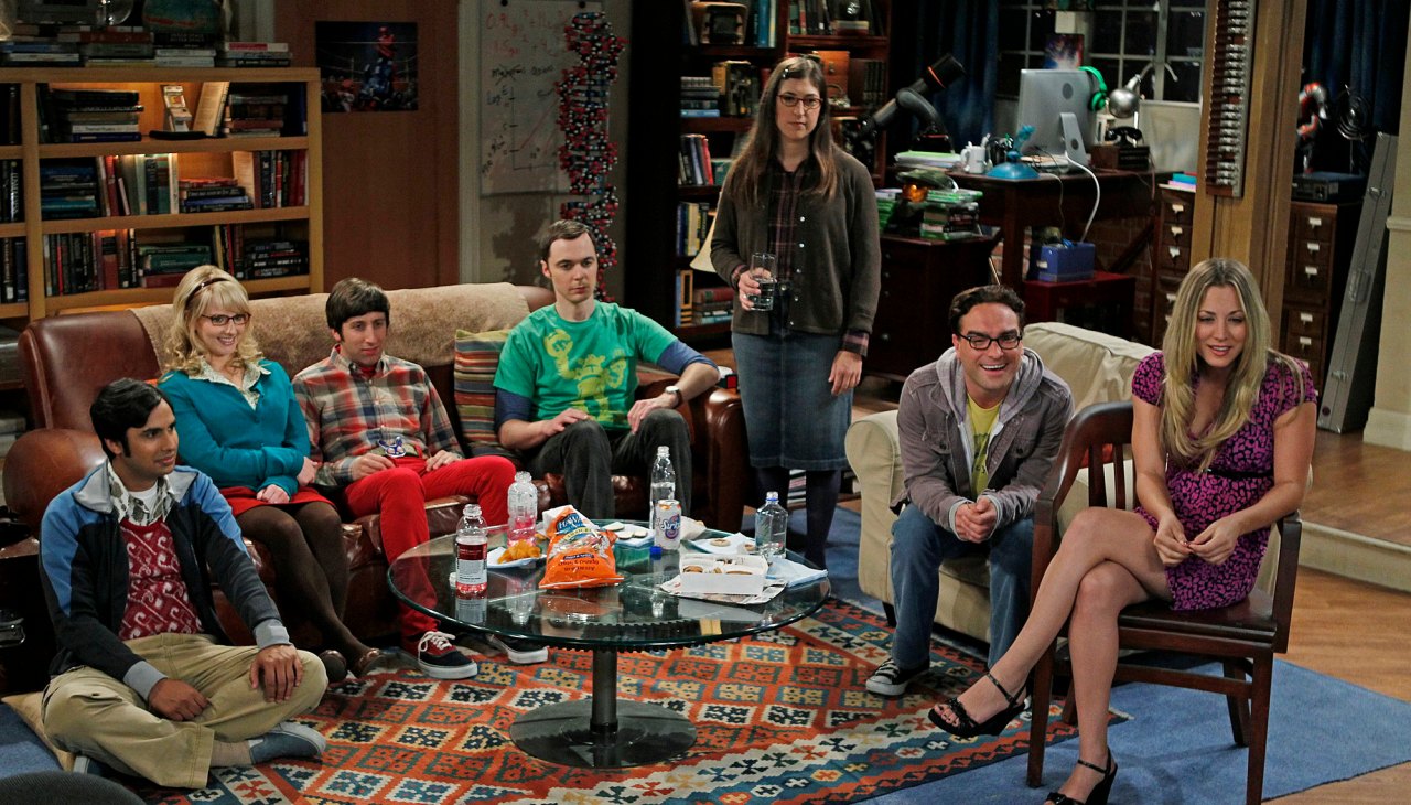Montana Jordan on set of a sitcom, smiling and portraying Georgie