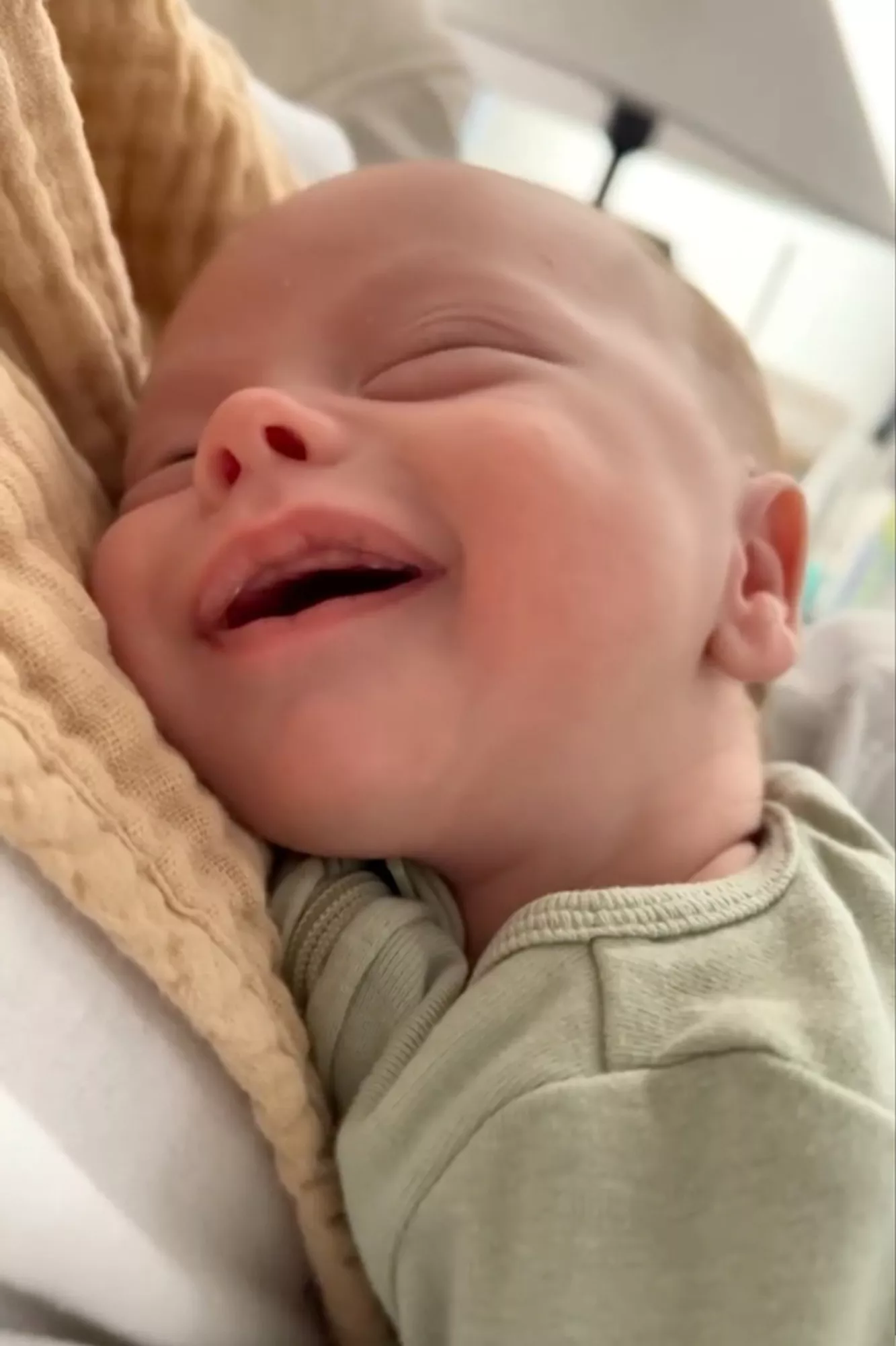 Eminem celebrating grandfatherhood with daughter Hailie Jade and grandson Elliot Marshall