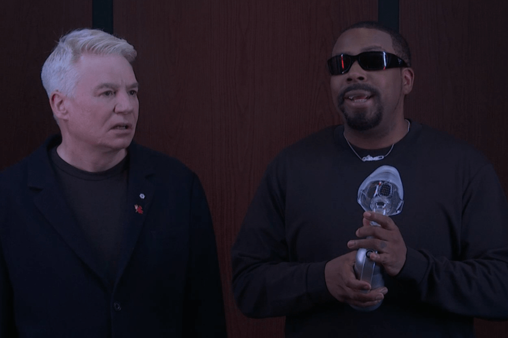Mike Myers in a recent SNL sketch, displaying his signature comedic style.