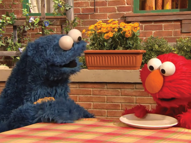 Big Bird and Elmo greet children on a bright Sesame Street set, symbolizing the global reach of Sesame Street Netflix PBS.