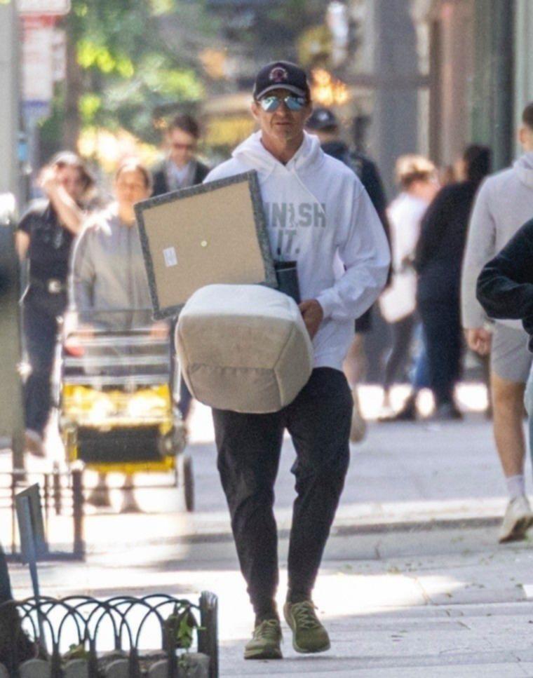 Hugh Jackman and Sutton Foster outside Jackman's New York apartment