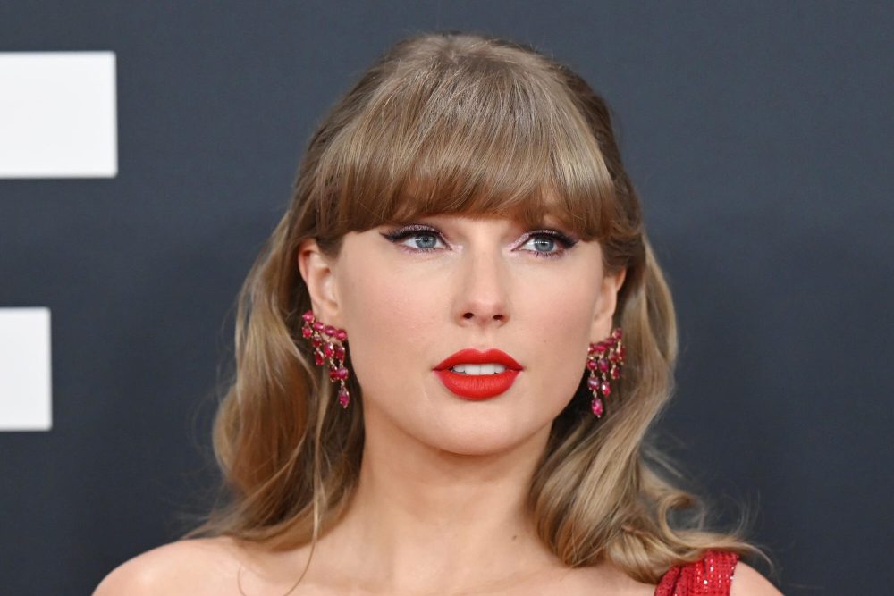 Taylor Swift walking into a legal hearing, reflecting the star's involvement in current lawsuits