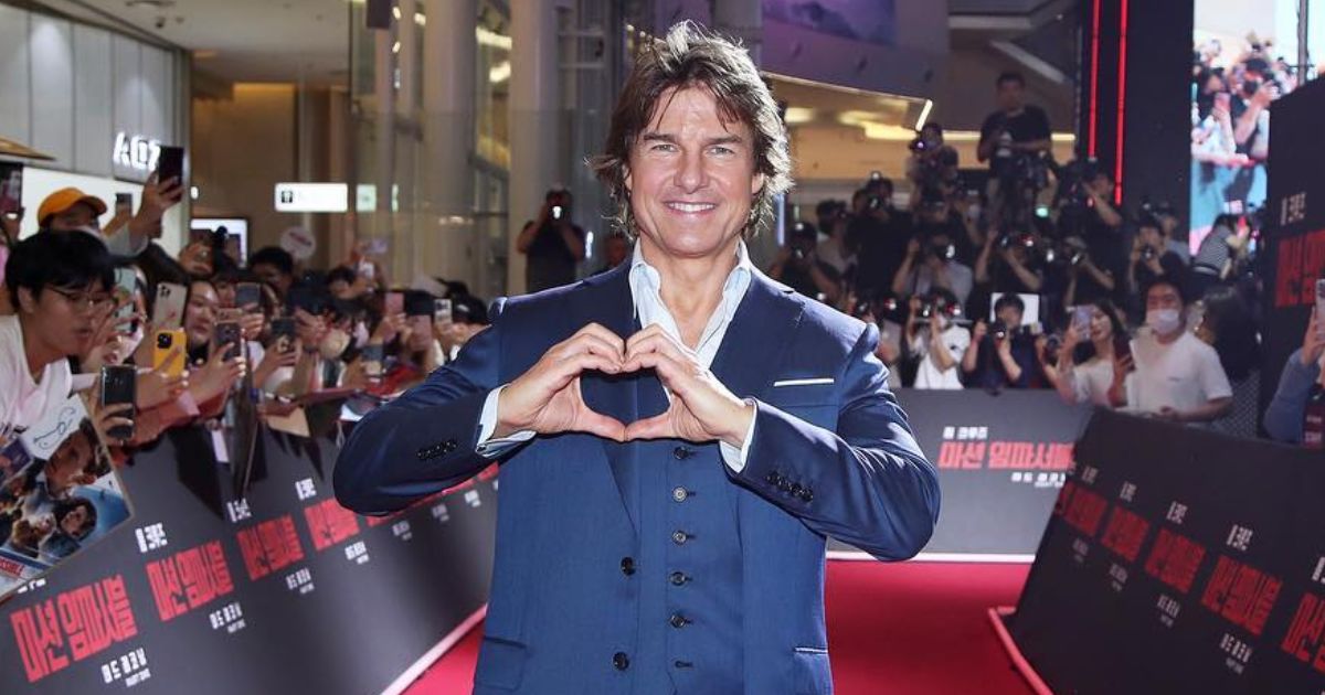 Tom Cruise at a film premiere, showcasing his wealth and influence in Hollywood