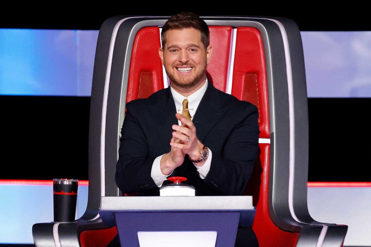 Michael Bublé smiling in a Team Blake shirt, early sign of his future on The Voice