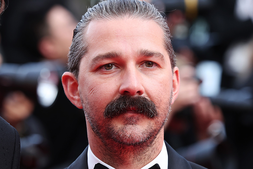 Shia LaBeouf standing during the Slauson Rec documentary premiere at Cannes Film Festival