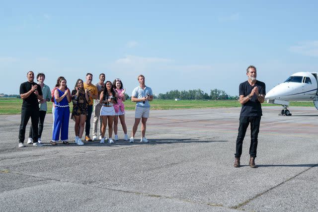 Destination X cast and host, Jeffrey Dean Morgan, stepping off the bus