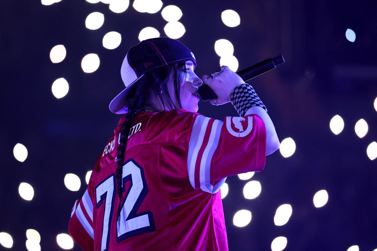 Billie Eilish performing live, capturing the excitement of fans eager for a Billie Eilish presale code