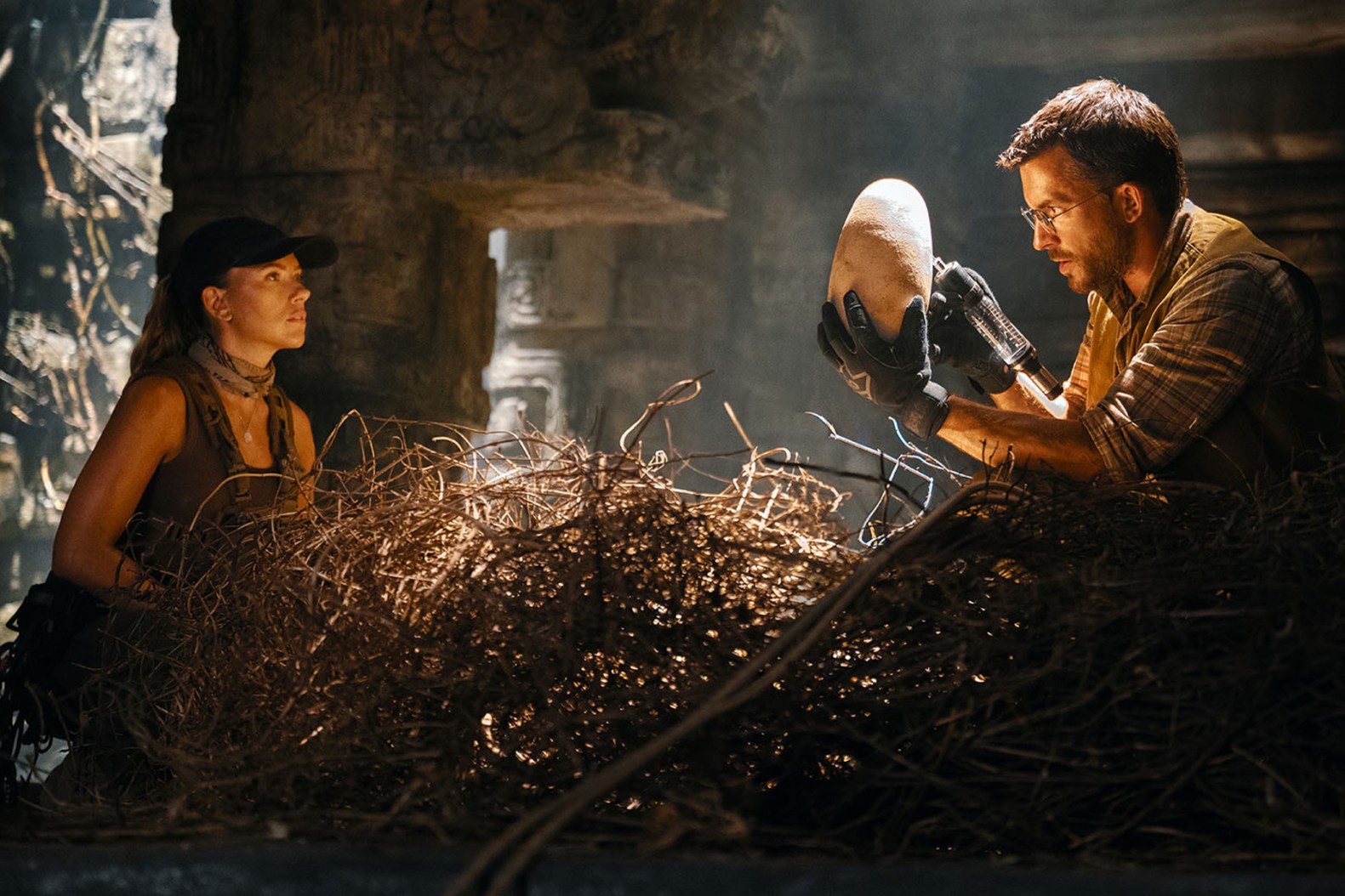 Scarlett Johansson confronts a dinosaur in Jurassic World Rebirth